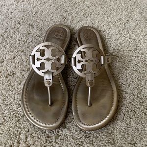 Tory Burch Miller sandal. Metallic. 8. More gold than platinum, soft gold.